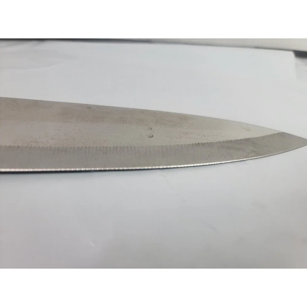 The Reinhart Collection Japan Stainless Steel Serrated Chef Knife Black Handle